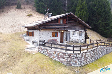 Porzione di rustico con terreno in vendita